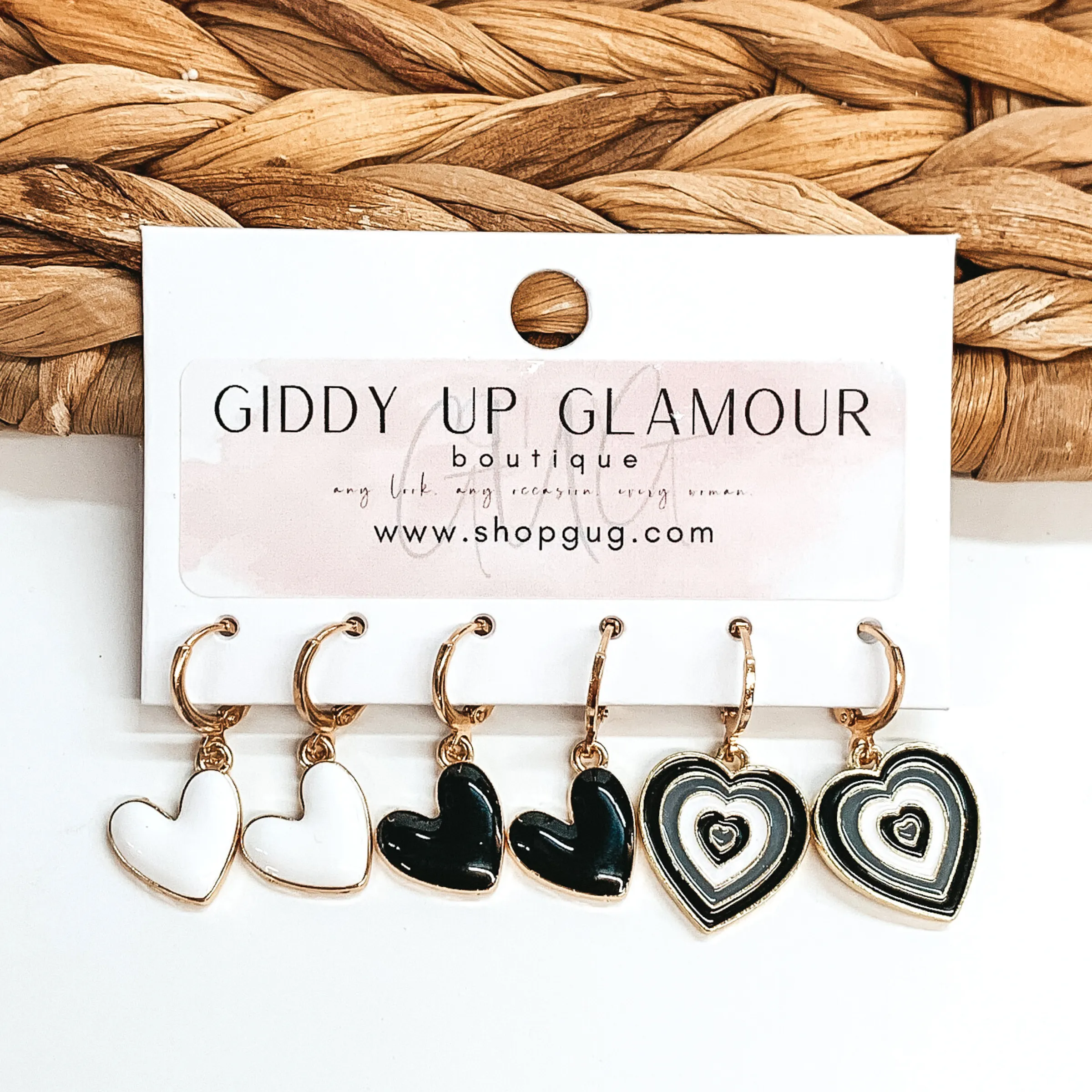 Gold Tone Hoop Huggie Earring Set with Black and White Heart Charms